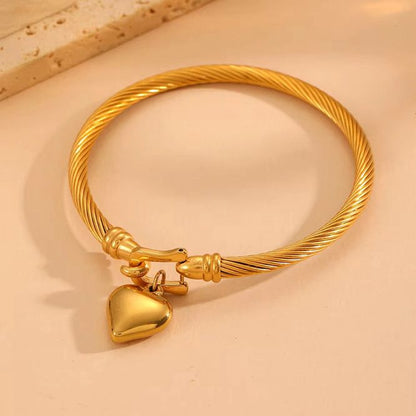 Golden Heart Cable Bracelet - Twisted gold bracelet with hanging heart charm